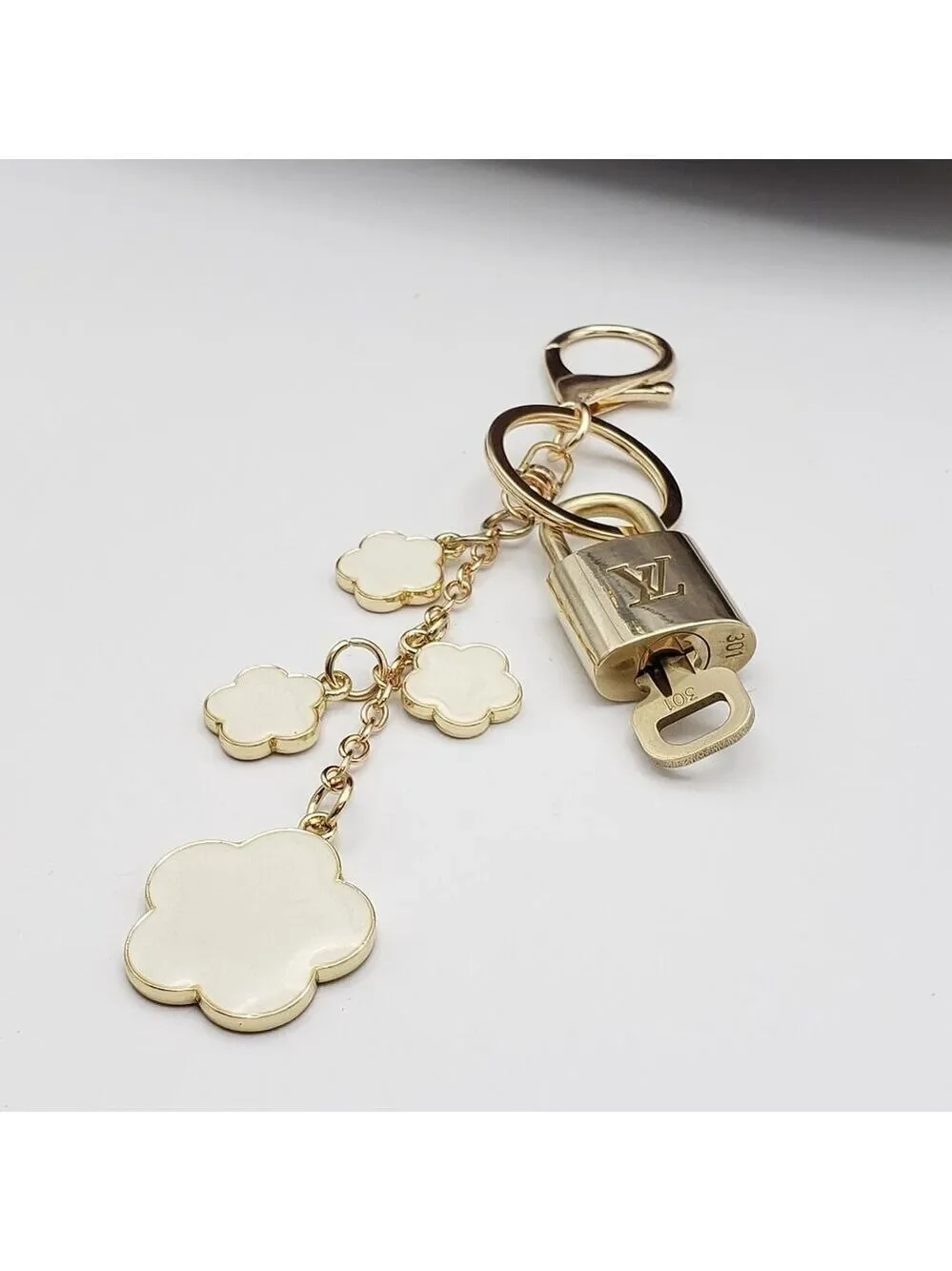 Authentic Louis Vuitton Lock & Key with Unbranded Flower Charm, Keychain